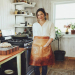 Brown leather half waist work apron worn in a kitchen environment