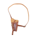 Brown leather shoulder holster laid flat showing strap and tie-down configuration
