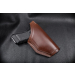Brown Leather OWB Hunting Holster front view with pistol grip visible on black background
