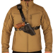 Black Leather Chest Holster With Tactical Mag Pouch worn on the chest, showing front view of adjustable harness and magazine pouch placement