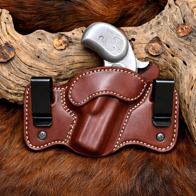 Brown Leather Dual Carry Holster shown in smooth Standard Saddle Brown vegetable oiled leather with white stitching and dual metal belt clips.