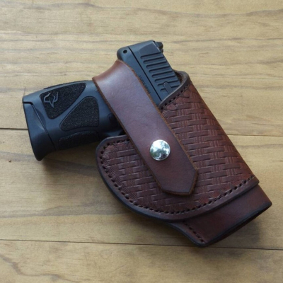 Brown Tooled Leather Thumb Break Holster with basketweave panel and snap retention strap
