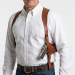 Law Enforcement brown leather vertical double shoulder holster worn under a light shirt, adjustable harness for balanced carry