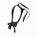Black leather single shoulder holster with vertical carry design, adjustable harness, and elastic support strap on a white background