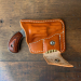 Brown Leather Pocket Holster With Ammo Pouch – front view – smooth stained vegetable tanned leather