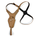 Tan vertical shoulder holster laid flat showing adjustable harness and tie down strap