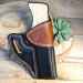 Two Tone Leather OWB Holster – front angle view – molded black and brown leather holster with reinforced belt slot