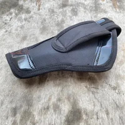 Black nylon hunting belt holster rear angle view showing belt loop strap and structured carry shape