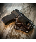 Black leather IWB clip holster with molded profile and contrast stitching for concealed carry