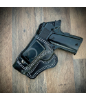 Black leather IWB holster with 10-degree cant showing molded fit and contrast stitching