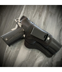 Black leather IWB holster with thumb break retention and metal belt clip