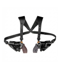 Dual leather shoulder holster system laid flat showing harness and paired holsters