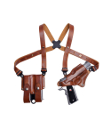 Classic leather shoulder holster system laid flat showing full harness and accessory layout