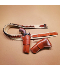 John Wayne style double single-action holster rig with suede-lined belt and .45 caliber cartridge loops laid flat