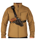 Black Leather Chest Holster With Tactical Mag Pouch worn on the chest, showing front view of adjustable harness and magazine pouch placement