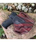 Mahogany woodgrain finish OWB leather belt holster showing molded profile and contrast stitching
