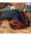 Walnut finish OWB leather belt holster showing molded fit and reinforced stitching