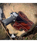 Mahogany leather OWB holster with thumb break retention handcrafted from vegetable tanned cowhide