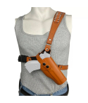 Tan leather chest carry holster worn on front torso with adjustable cross body harness