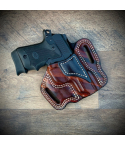 Walnut finish OWB leather belt holster showing molded fit and reinforced stitching