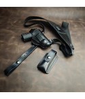 Black leather Walther PPK/S shoulder holster set laid flat with pistol holster, magazine pouch, and adjustable strap system