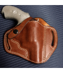 Brown Leather OWB Thumb Break Holster in smooth Standard Saddle Brown vegetable oiled leather with white stitching, belt slots, and a one way snap retention strap.