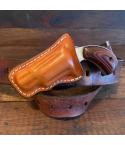 Brown leather pocket clip revolver holster front view with molded leather body
