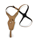 Tan vertical shoulder holster laid flat showing adjustable harness and tie down strap