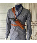 Brown leather Western shoulder holster rig with cross-body strap